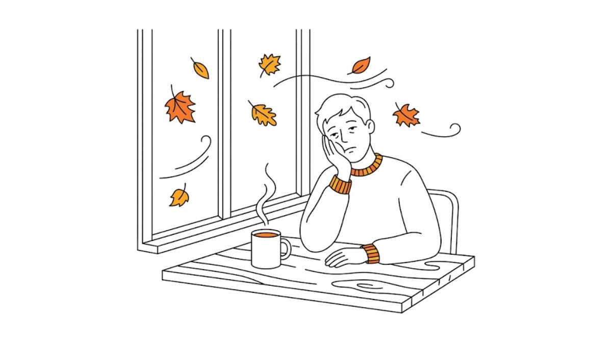 落ち葉の舞う窓辺で気だるそうに頬杖をつく人物のフラットイラスト