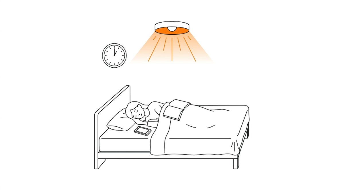 明かりがついたままの部屋で、ベッドの上に開いたままの本とスマホがあるフラットイラスト