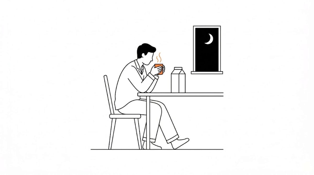 夜のキッチンで、湯気の立つマグカップと牛乳パックが置かれたテーブルのフラットイラスト